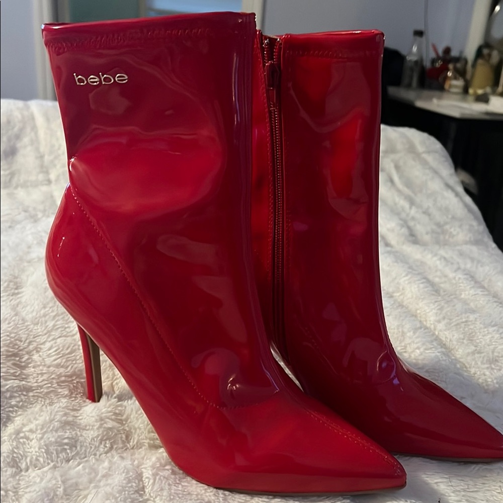 Bebe Red Heeled Boots with Sleek Silhouette
